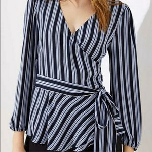 Blue and white tripped wrap around blouse
